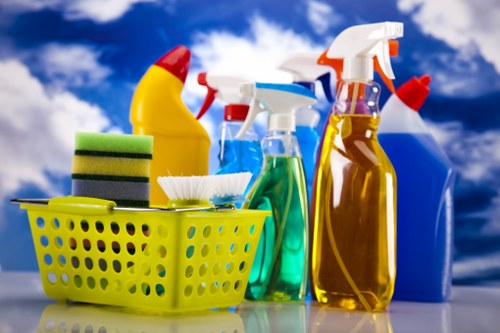 Commercial office cleaning team sanitising desks and shared areas in Enfield